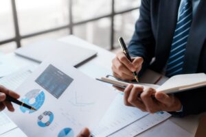 Business people are meeting show business growth to plan new business expansion in the future.