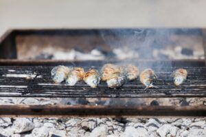 Grilled sardines in Porto, Portugal. Delicious traditional street dish