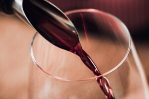 Red Wine Pouring Into Wine Glass