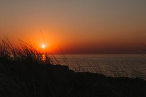 silhouette at sunset in Portugal, beautiful landscape. Summertime, holidays and relax concept